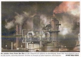 As smoke rises from the fire at the Chevron oil refinery in Richmond, State Bar investigators were on the scene, advising disaster victims to beware of unscrupulous soliciations.
