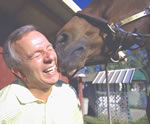 Daughter Julia's horse Dillon gives Capozzi an affectionate nuzzle.