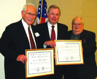 State Bar President John Van de Kamp (center), presented certificates acknowledging 50 years of bar membership to Seymour M. Rose (left) and Mortimer Herzstein.