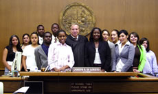 Los Angeles Superior Court Judge Joseph Di Loreto stands with members of the Littles in Law program after they argued a slip-and-fall case in a mock trial.