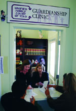 Julie Osborne (L) and Julia Farrar help clients at the Yolo county Gardianship Clinic