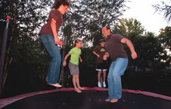 Jeff Bleich and family on trampoline